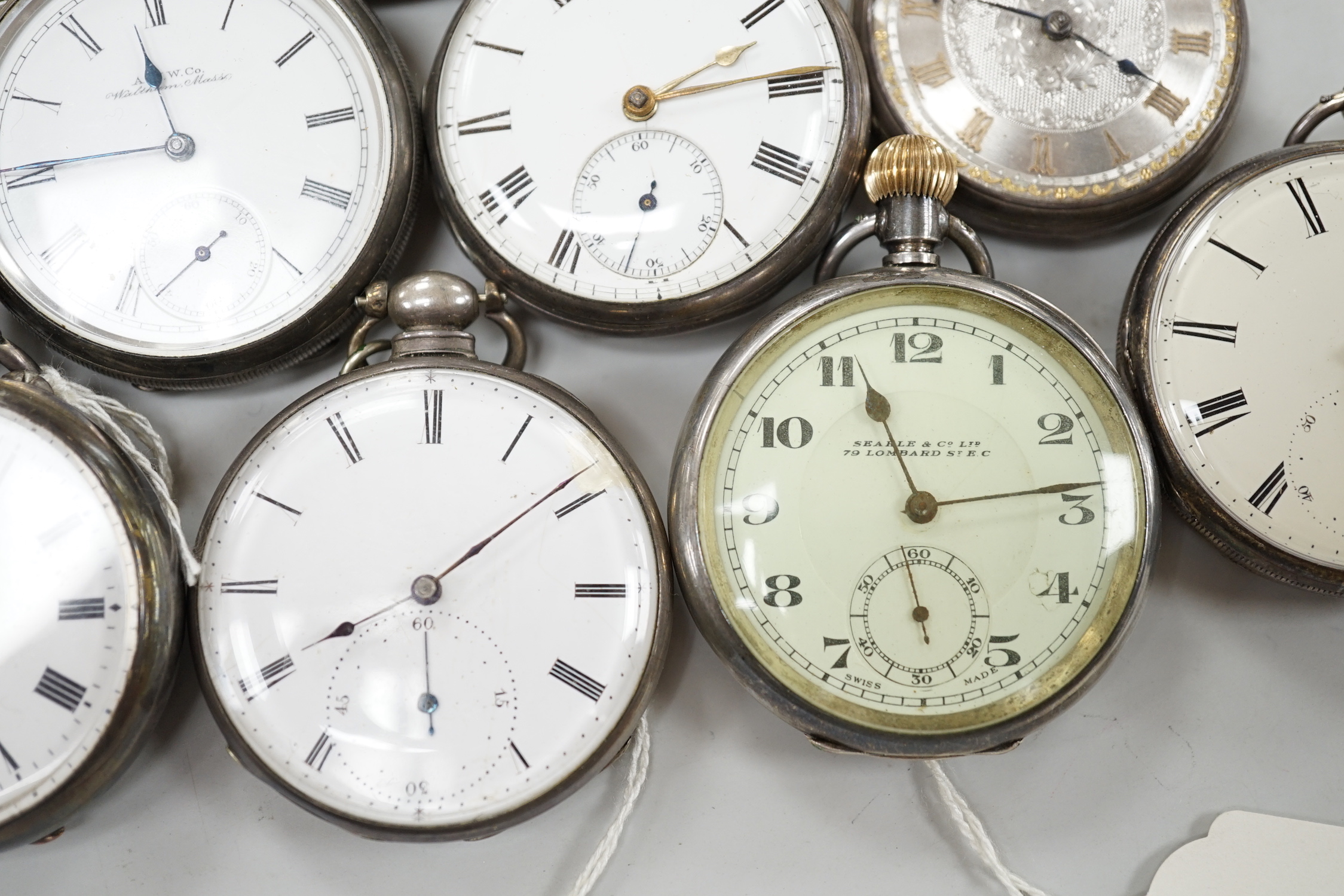 Twelve assorted silver or base metal pocket watches including chrome Omega, Searle & Co and gold plated hunter.